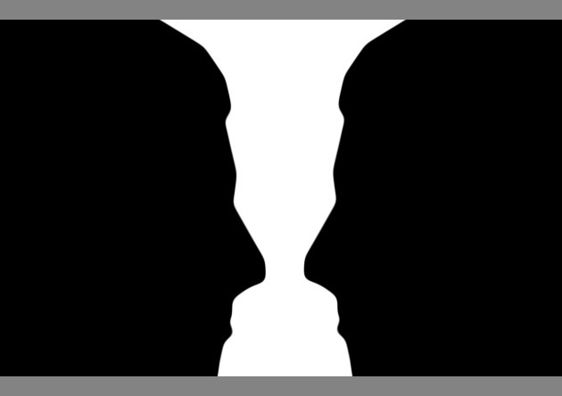 Two_silhouette_profile_or_a_white_vase